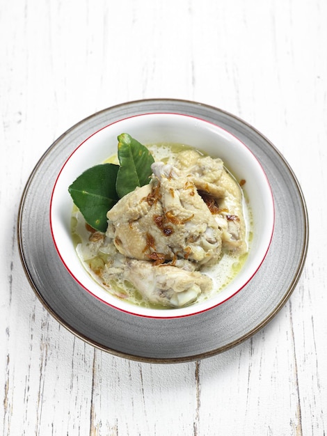 Opor ayam or chicken white curry is traditional Indonesian culinary food