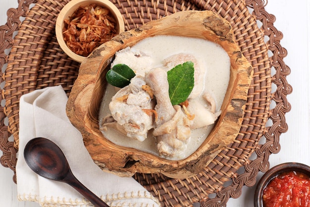 Opor ayam or Chicken White Curry Traditional Indonesian Food made from Chicken Cooked with Coconut Milk and Spices