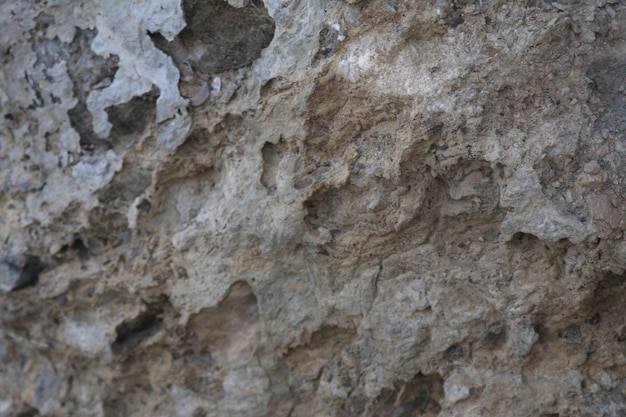 Oppervlak van het marmer met bruine tint steen textuur en achtergrond