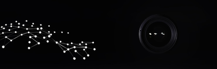 Photo optics to the camera on the operator's desk flare in the glass of a photo lens background with the technique of the photographer