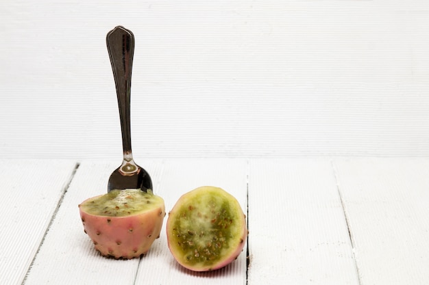 Opuntia ficus-indica cactus fruits on a white background