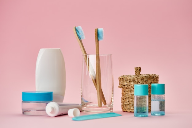 Oral care products, two toothbrush and toothpaste, macro view. Morning healthcare procedures concept