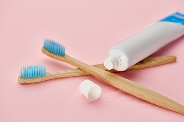 Oral care products, two toothbrush and toothpaste. Morning healthcare procedures concept, toothcare