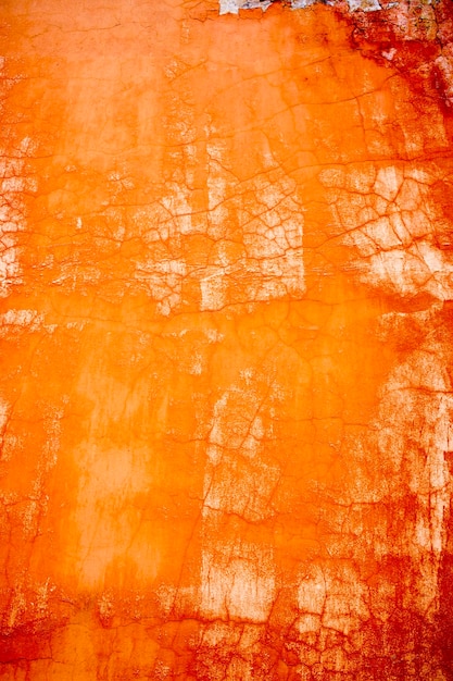 Tratti di pittura a olio di sfondo arancione astratto di diverse sfumature