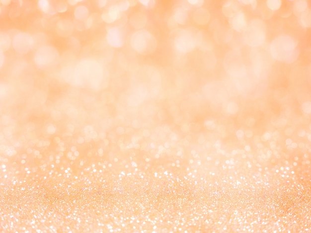 Photo orange abstract glitter background with bokeh