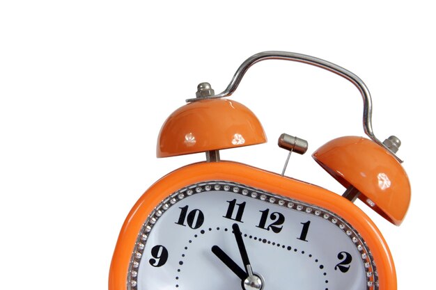 Orange alarm clock on a white background