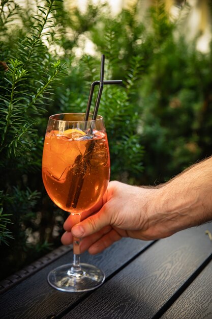 orange alcoholic drink in glasses with ice