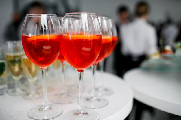 Orange aperol glasses at a banquet