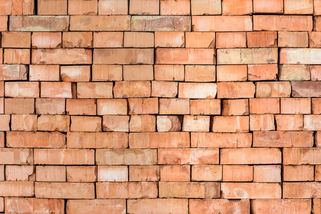 The orange background of the textured brick is laid down the hills