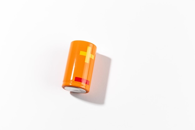 Orange battery on white background energy concept