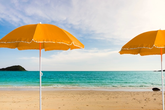 Orange beach umbrella collage