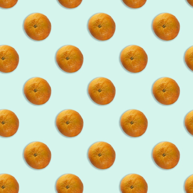 Orange on a blue background seamless pattern