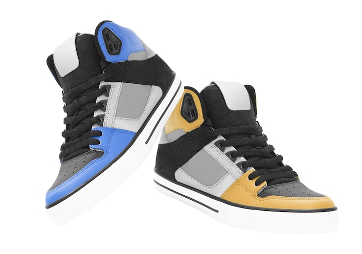 Photo orange and blue shoes isolated on white
