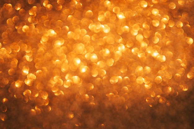 Orange bokeh and defocused background with copy space