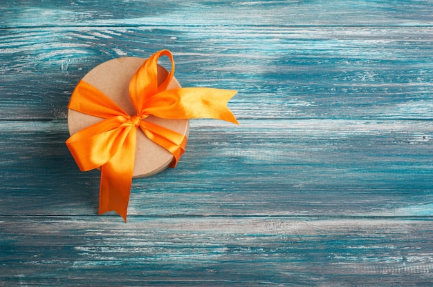 Orange bow with handmade present box