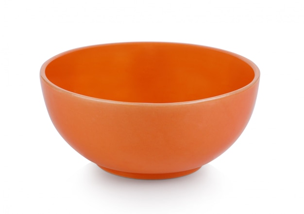 흰 벽에 주황색 그릇