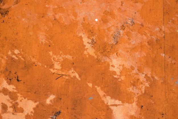 Orange-brown cement wall texture background