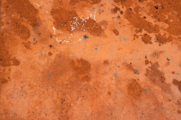 Orange-brown cement wall texture background