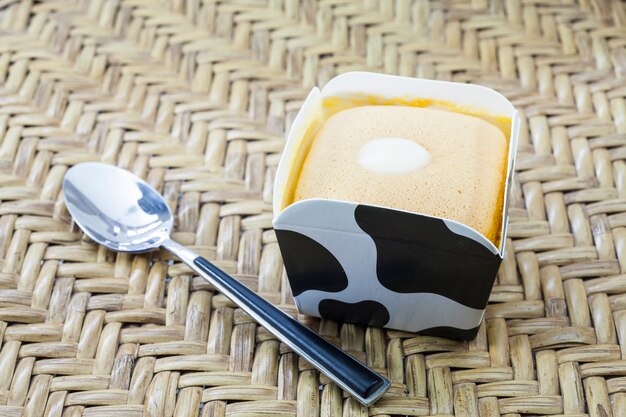 Orange Cake on Cow Cup.