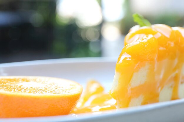 Orange cake on wood background