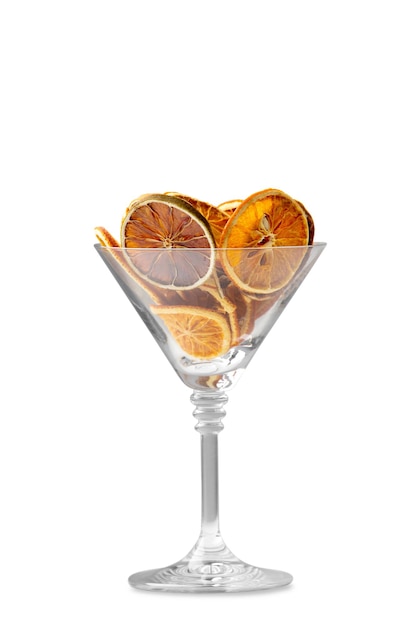 Orange chips in a glass bowl on a white background