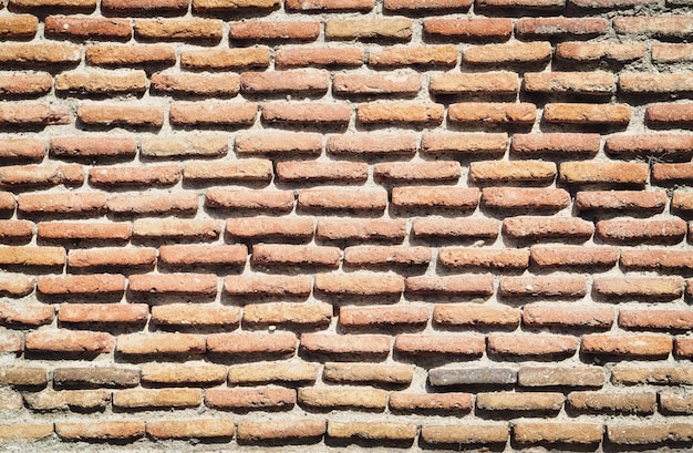 Orange clay brick work wall texture