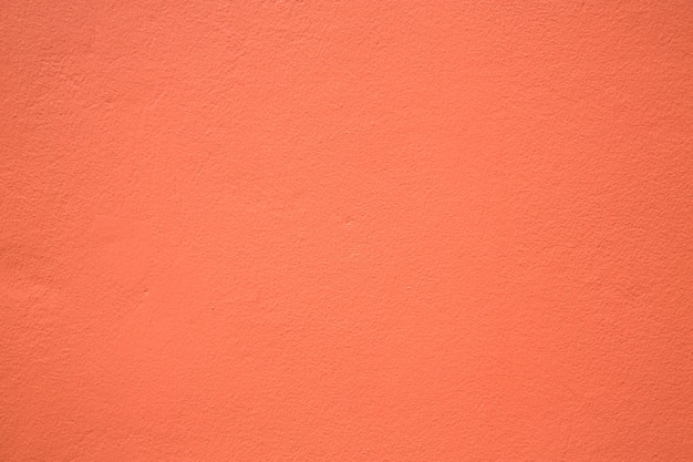 Orange color paint on concrete wall