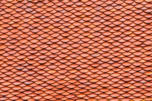 Photo orange color roof tiles background