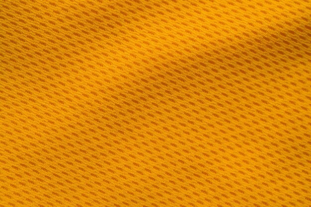 Orange color sports clothing fabric jersey football shirt texture top view