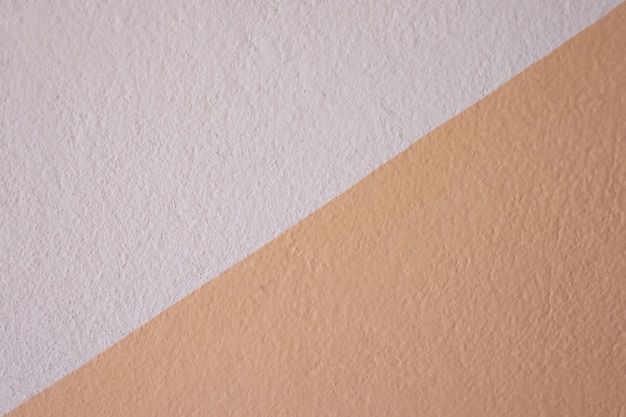 작업 배경 개념에서 디자인을위한 벽의 오렌지 콘크리트 질감.