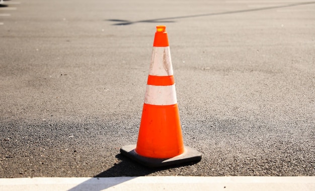 Orange construction cones represent construction zones roadwork caution and temporary barriers fo