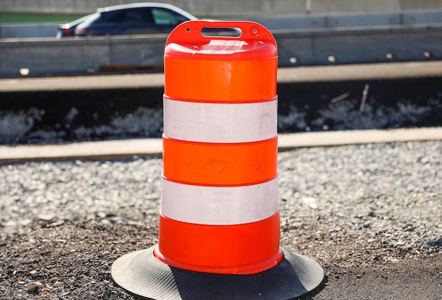 Orange construction cones represent construction zones roadwork caution and temporary barriers fo