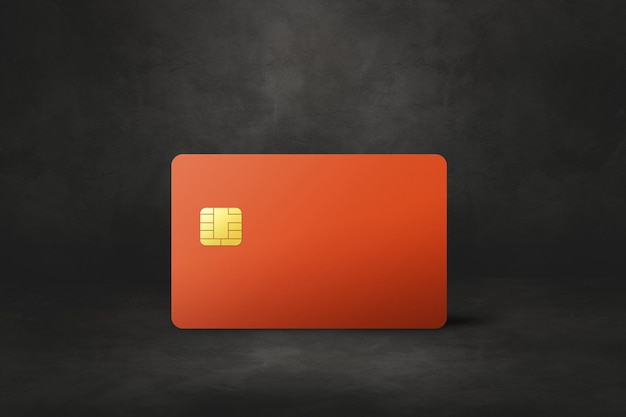 Orange credit card template on a black concrete background 3D illustration