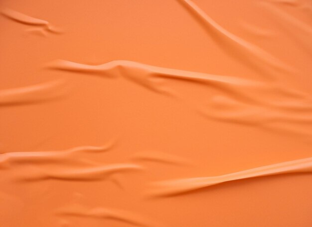 Orange crumped paper poster texture background