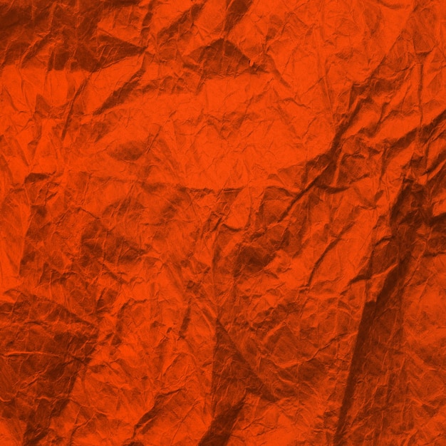 Orange crumpled paper Texture kraft paper Lush Lava color Recycled paper background