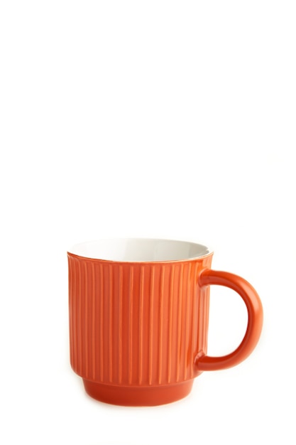 Orange cup isolated on white background. Top view