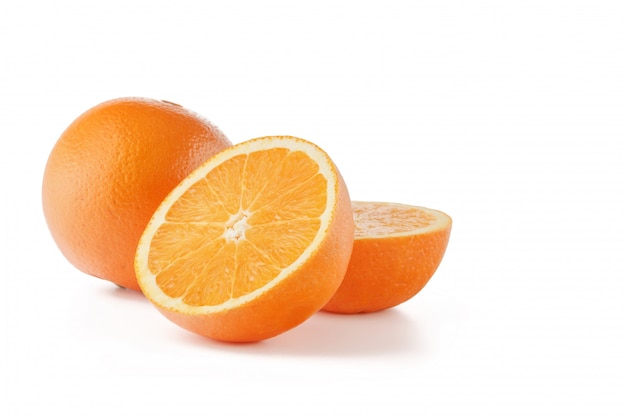 Orange cut in half on a white