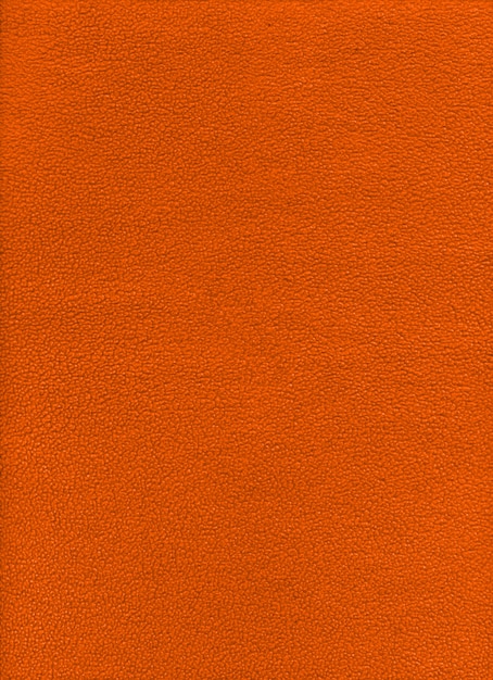 Orange fleece background texture. close up view