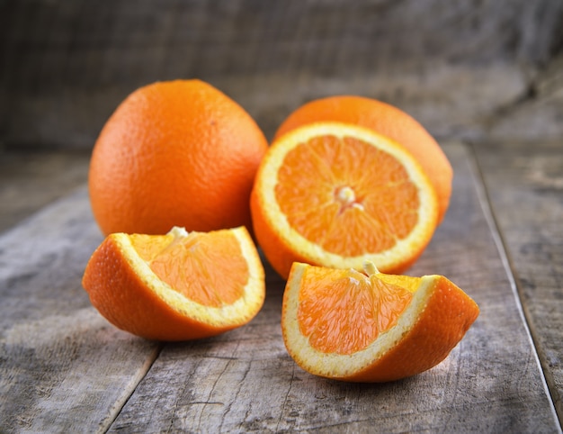 Orange fruit on brown wooden table