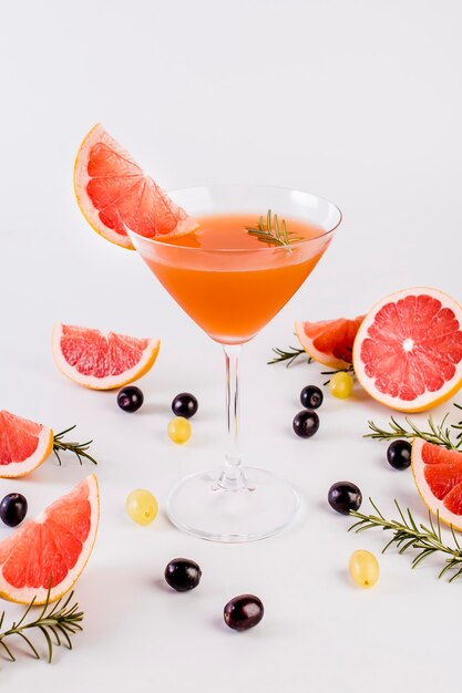 orange fruit drink against white background