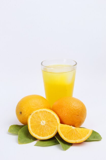 orange fruit and a glass of fresh orange ice that is very good for health