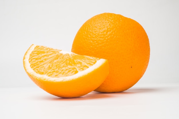 Orange fruit on white background