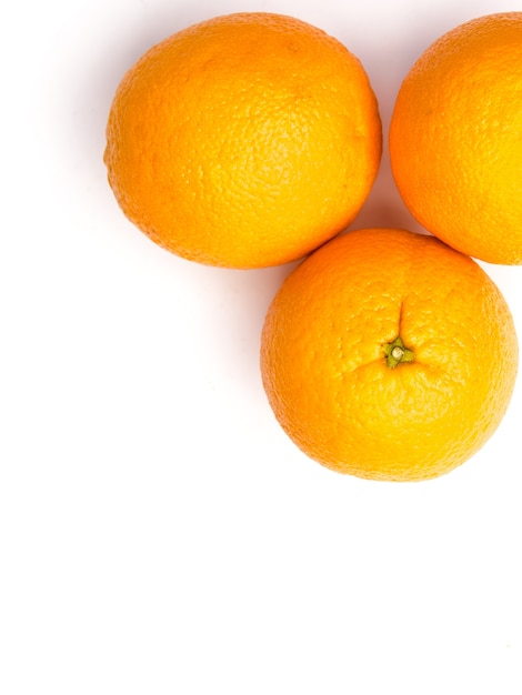 Orange fruit on white background