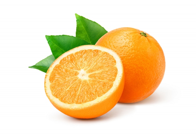 Orange fruit with cut in half and green leaves isolated on white background