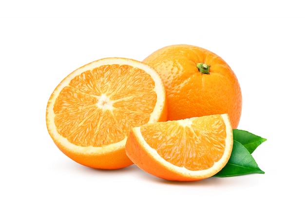 Orange fruit with cut in half and green leaves isolated on white background