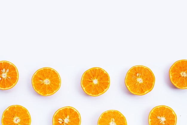 Orange fruits on white surface