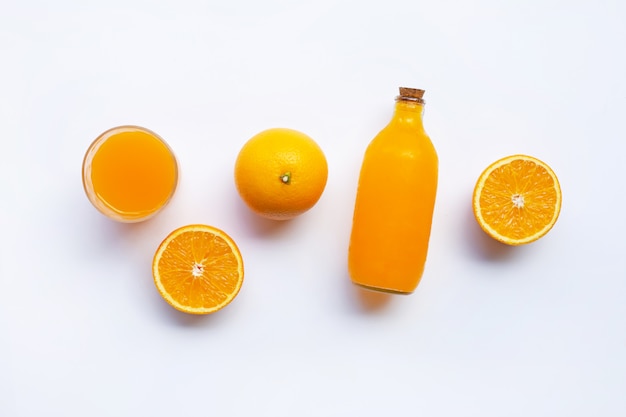 Orange fruits with Orange juice isolated on white background.  Top view