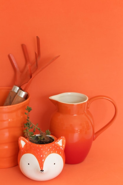 Orange gardening utensils