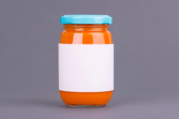 Orange glass jar for baby food