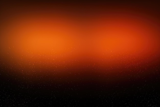 Orange glowing color gradient on black grainy background